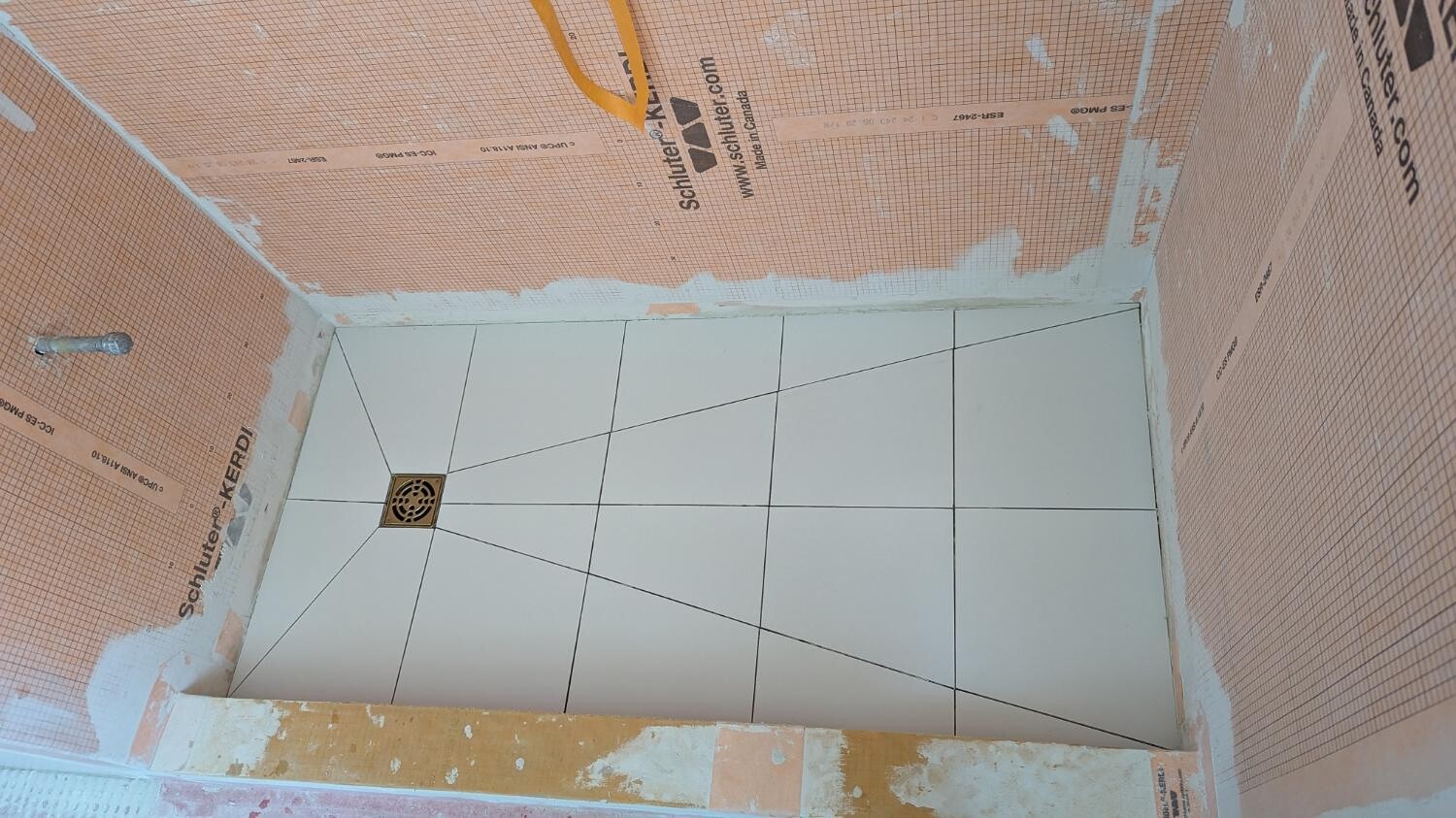 Shower floor sloped and waterproofed