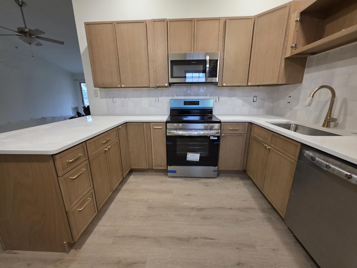 Light oak kitchen from the range wall